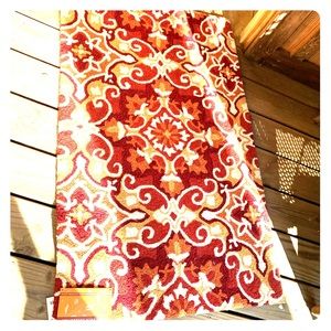 NEW indoor rugs. Orange and White.